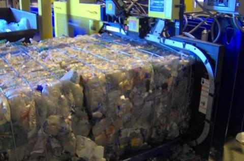 Plastic bales (PET) baled in a Two Ram Baler with Lid Press
