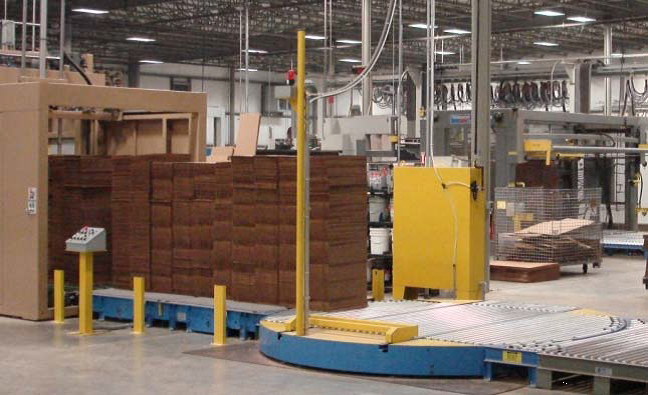 Shown is a press infeed conveyor with Powered Rotating Device